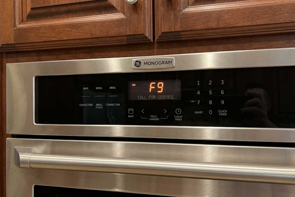 GE Monogram wall oven control panel showing an F-code on the display